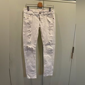 Guess white jeans with distressed rips. Size29